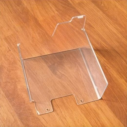 Bent clear acrylic product holder with machined mounting holes